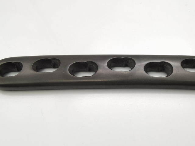 Interventional materials Orthopedic implants Multi-axial femur Curved Locking Plate of titanium